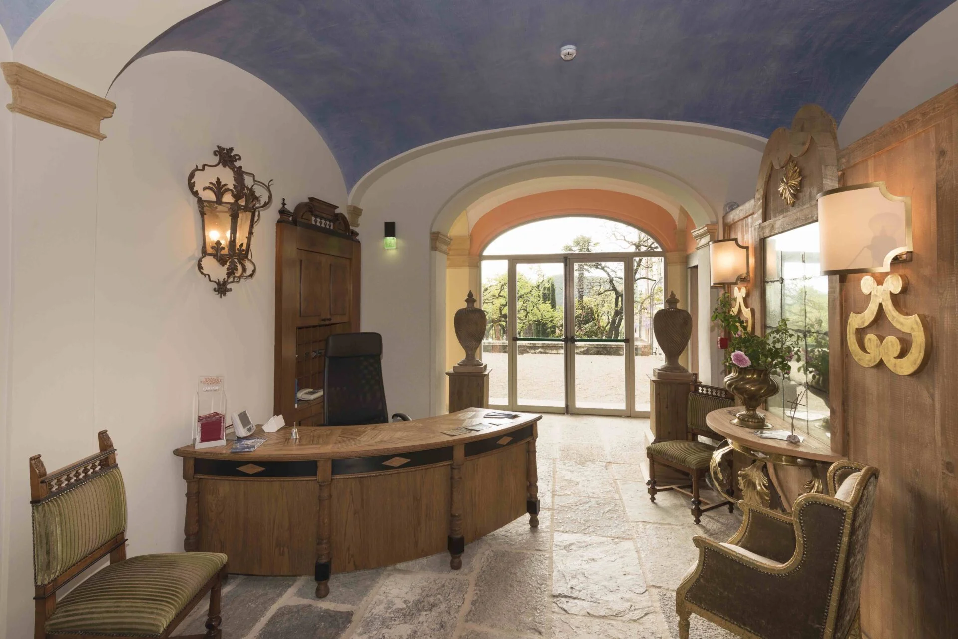 Elegant historic reception room at Casa Dei Padri retreat center in Lago d'Orta, Italy